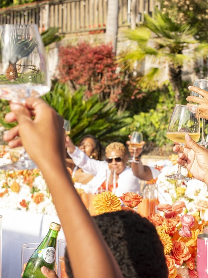 Guests raising their glasses
